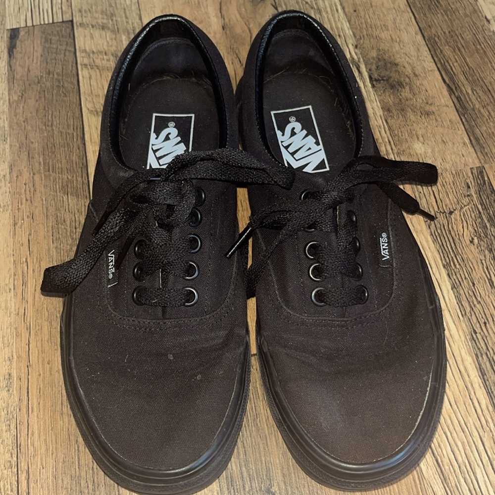 All black Vans sneakers